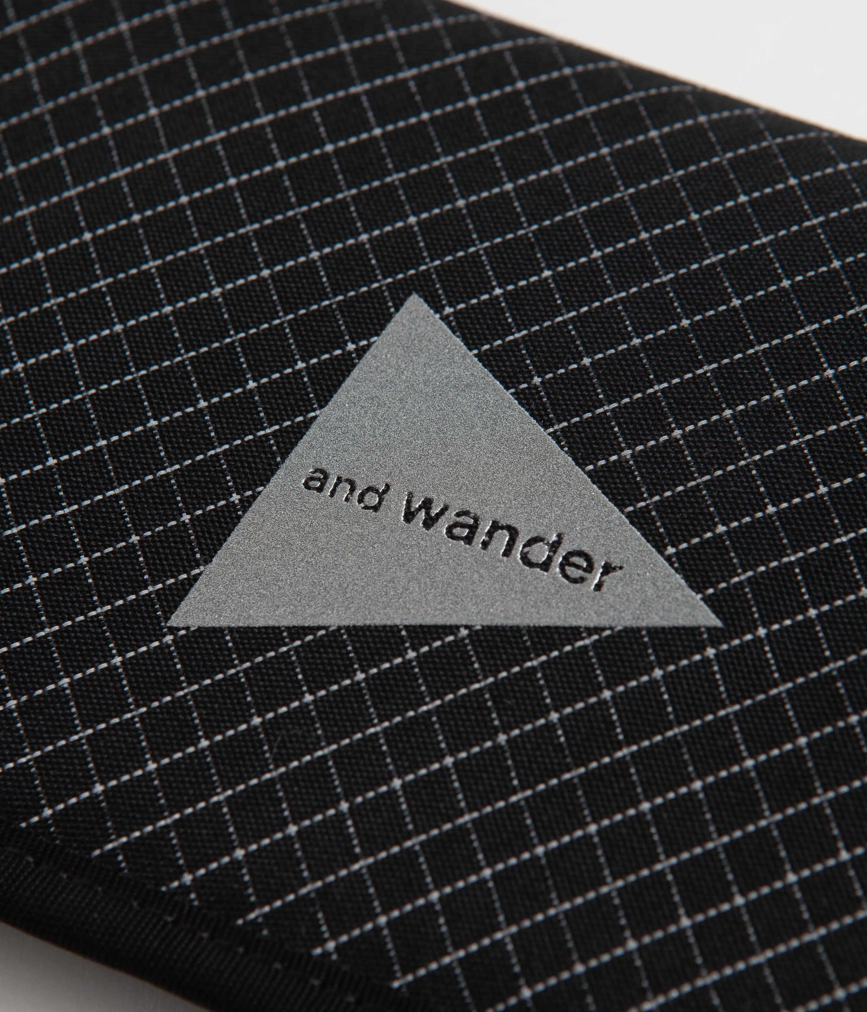 and wander Reflective Rip Pouch - Black